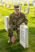 General Mark A. Milley who serves as the 20th Chairman of the Joint Chiefs of Staff placed his challenge coin near the headstone of Master Sergeant Joshua L. Wheeler in Section 60 of Arlington National Cemetery.